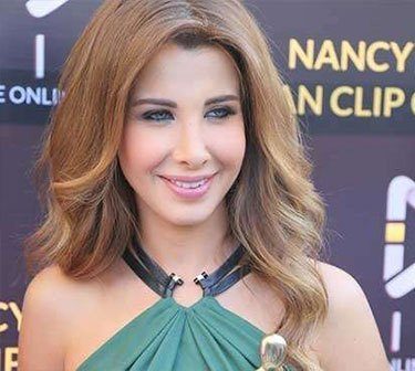 صور نانسي عجرم اثناء تصوير فيديو كليب 