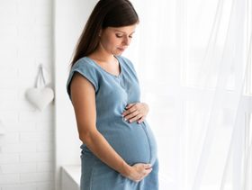ما الفرق بين بطن الحامل والكرش وهل هو من اعراض الحمل الاولية؟
