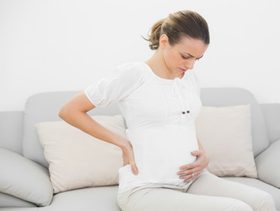 اسباب آلام اسفل البطن للحامل في الشهر الثالث