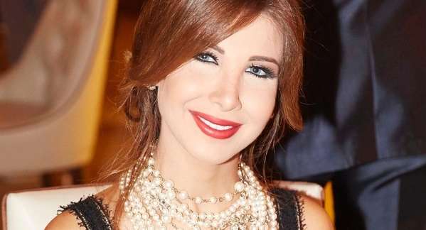 نانسي تنشر صورة مميزة تجمعها بأبيها مع تعليق مؤثر