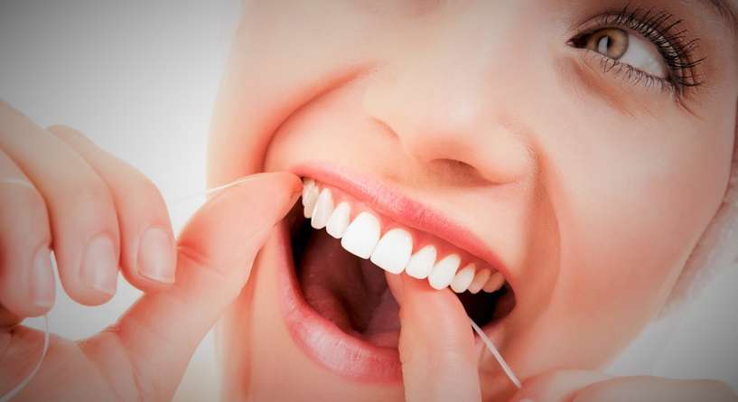 فوائد تنظيف الاسنان بالخيط