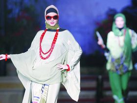 ازياء المحجبات الى العالمية