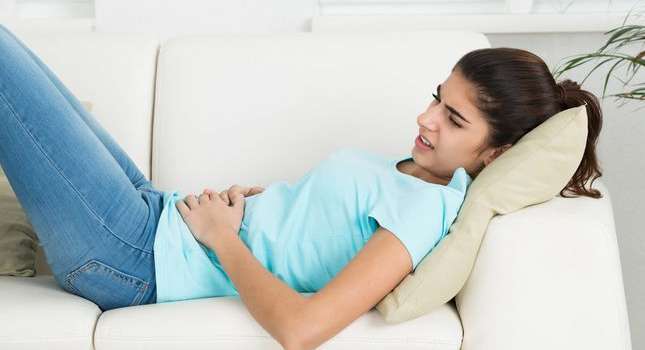 هل المغص المتقطع من اعراض الحمل
