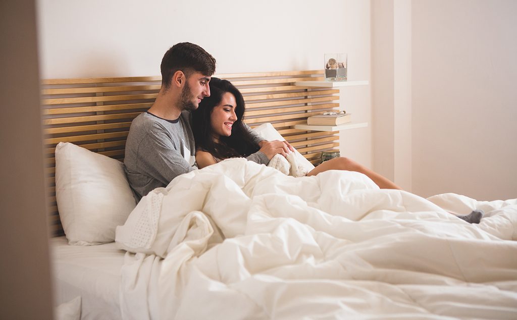 loving couple lying bed