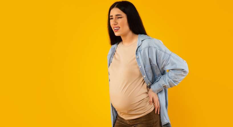 ألم أسفل البطن والظهر مع إفرازات بيضاء في الشهر التاسع